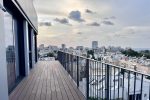 Urban balcony with city skyline view