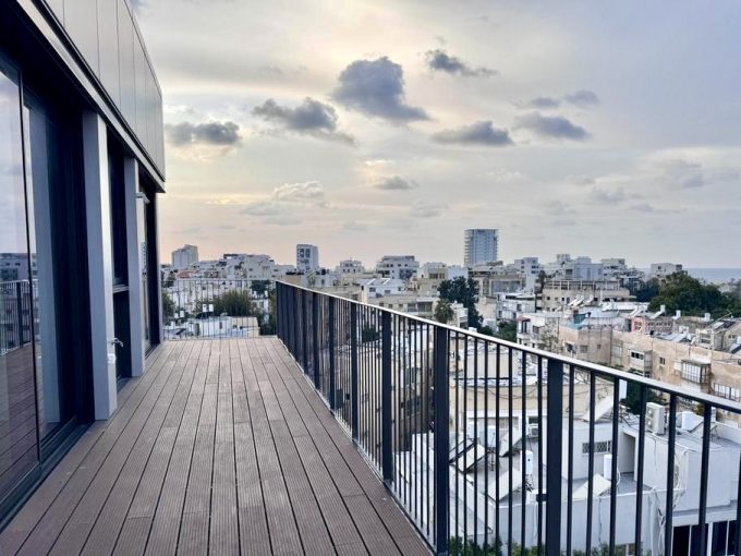 Urban balcony with city skyline view